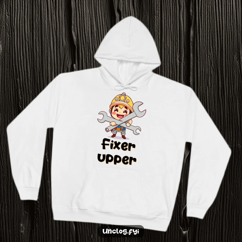 Funny cute character gleefully holding a giant wrench with a proud smile, featured on a cozy hoodie.